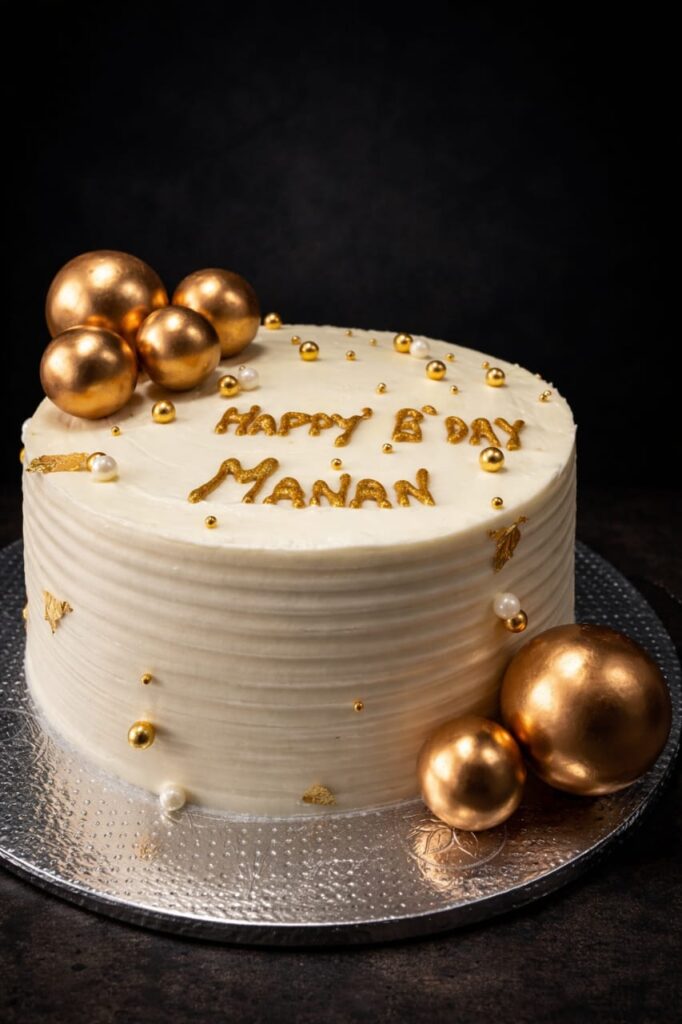 pravshi cakes happy birthday manan golden white cake